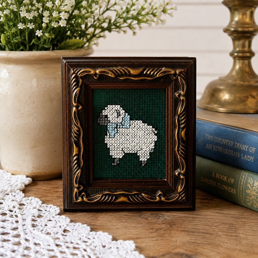 Framed mini cross-stitch art  handmade design white sheep on dark green fabric